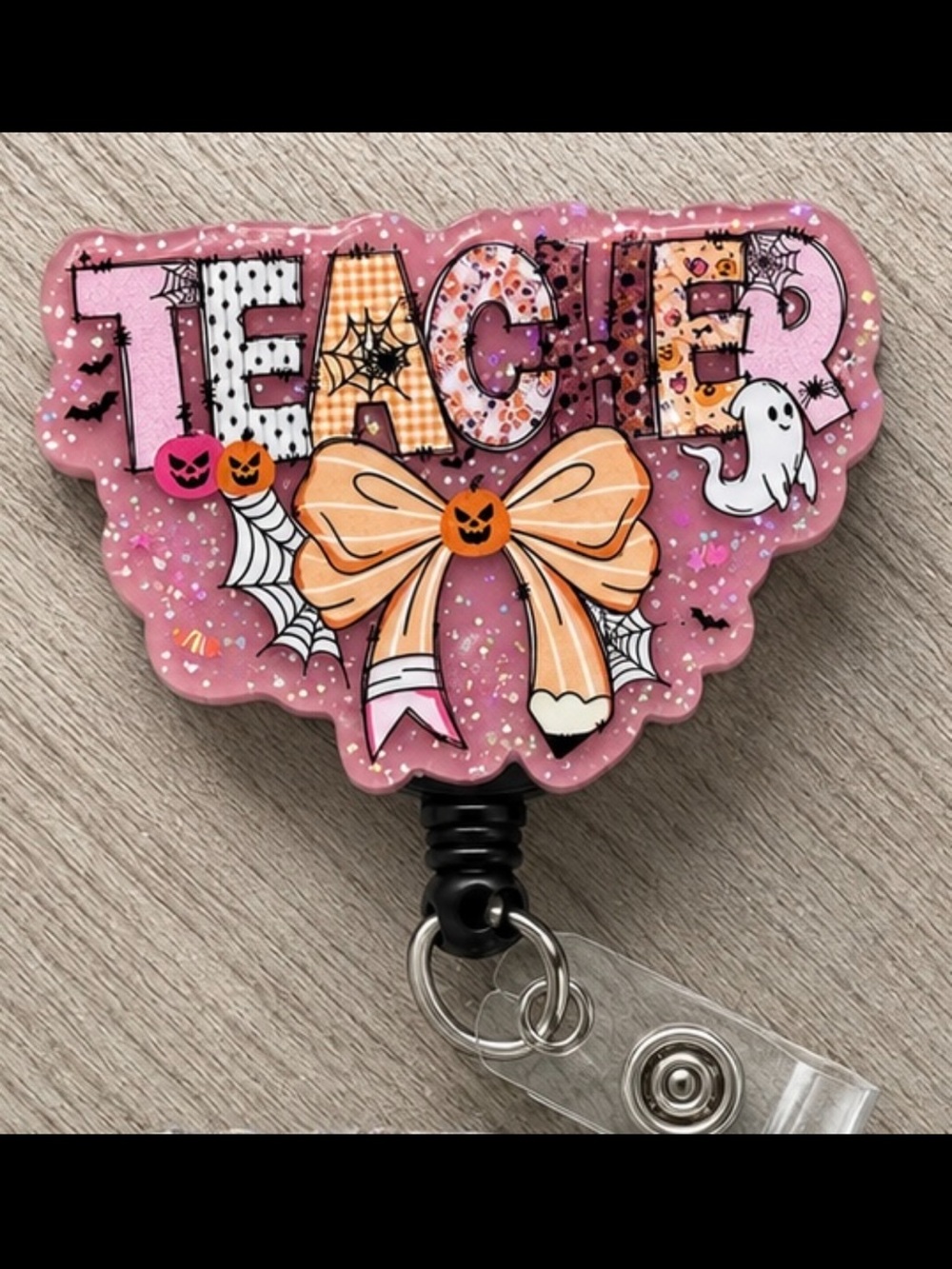 Pink 'Teacher' Halloween Badge Reel with Bow